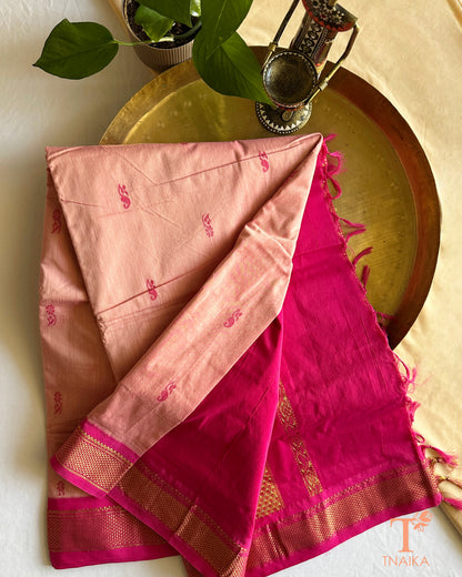 Soft cotton saree featuring traditional woven border and tassels