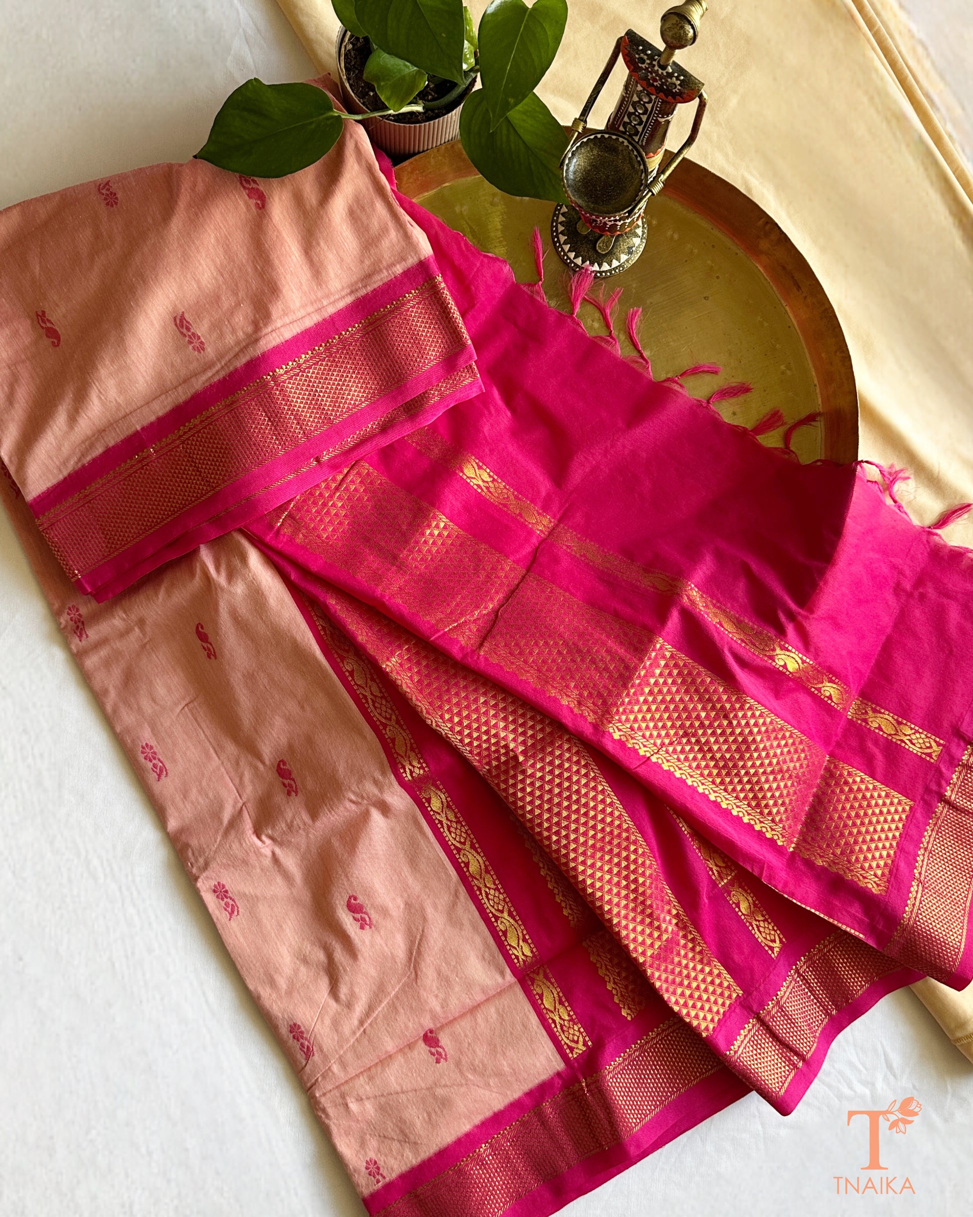 Lightweight cotton saree with intricate zari detailing on border