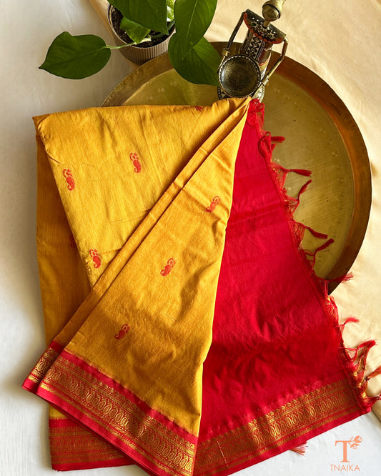 Soft cotton saree featuring traditional woven border and tassels