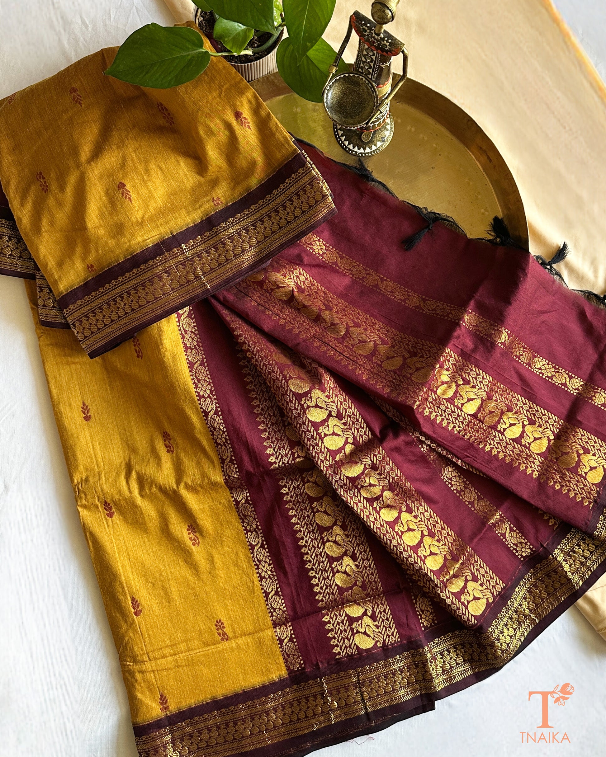 Lightweight cotton saree with intricate zari detailing on border