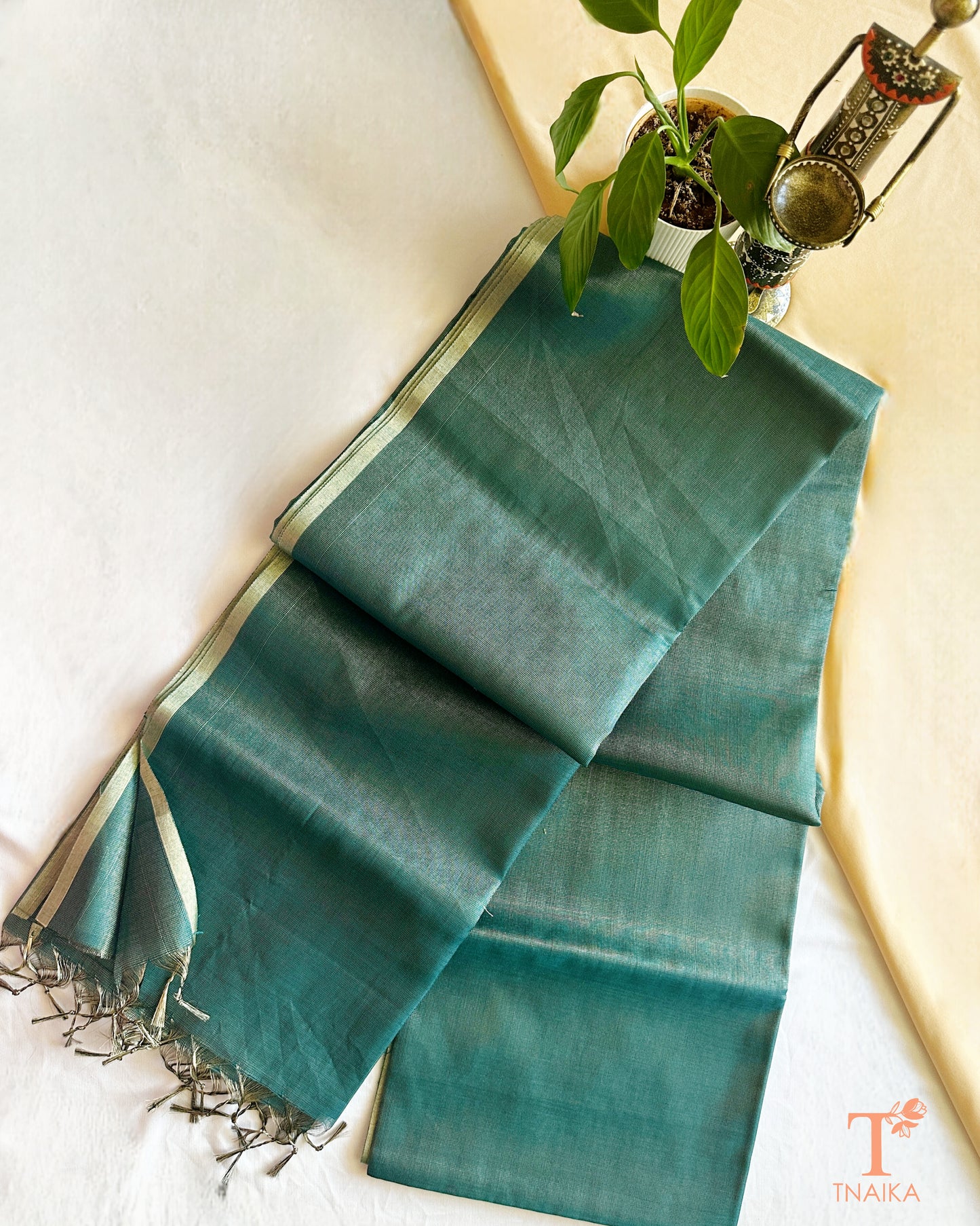Chanderi tissue silk saree in green shade with lightweight drape