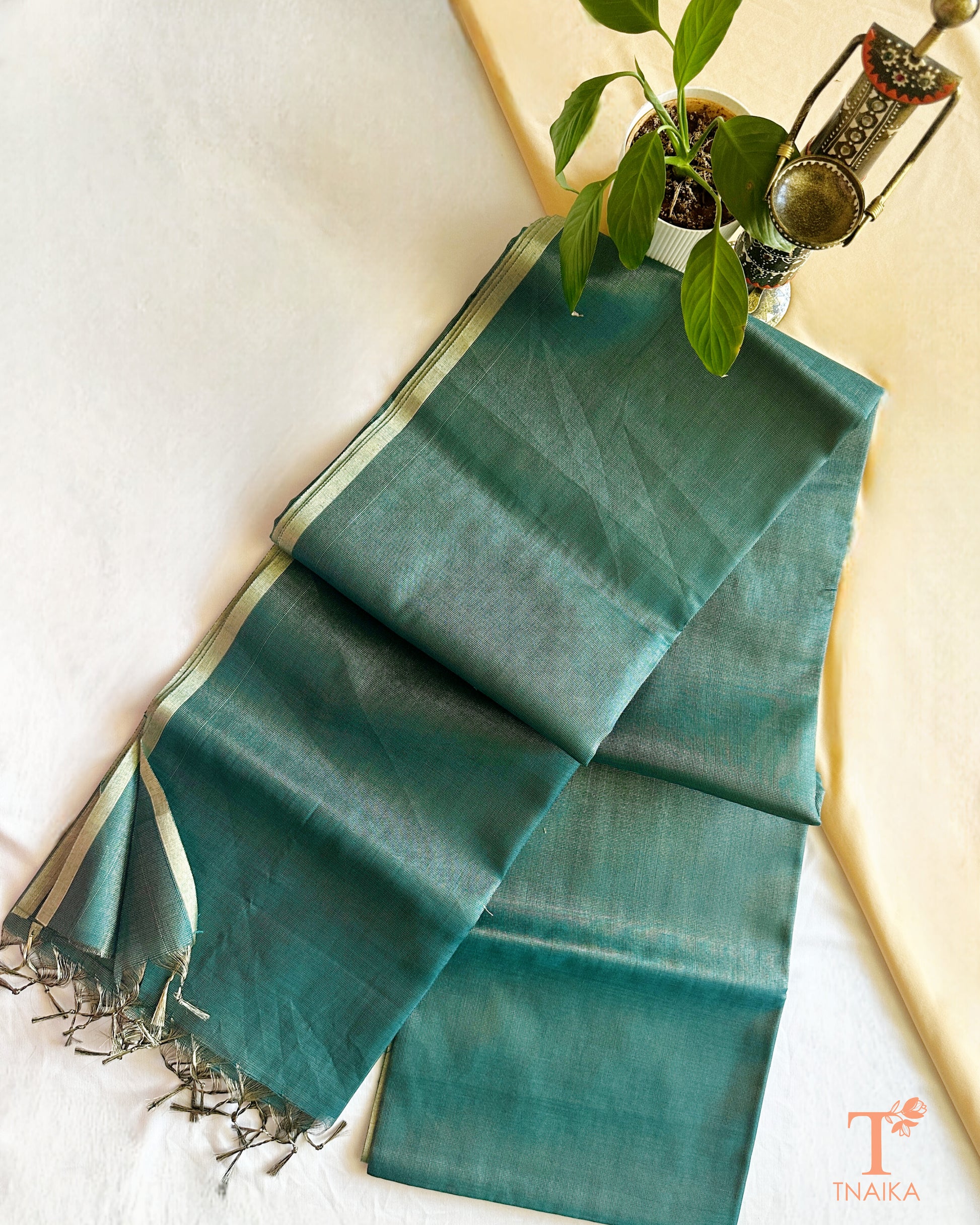 Chanderi tissue silk saree in green shade with lightweight drape