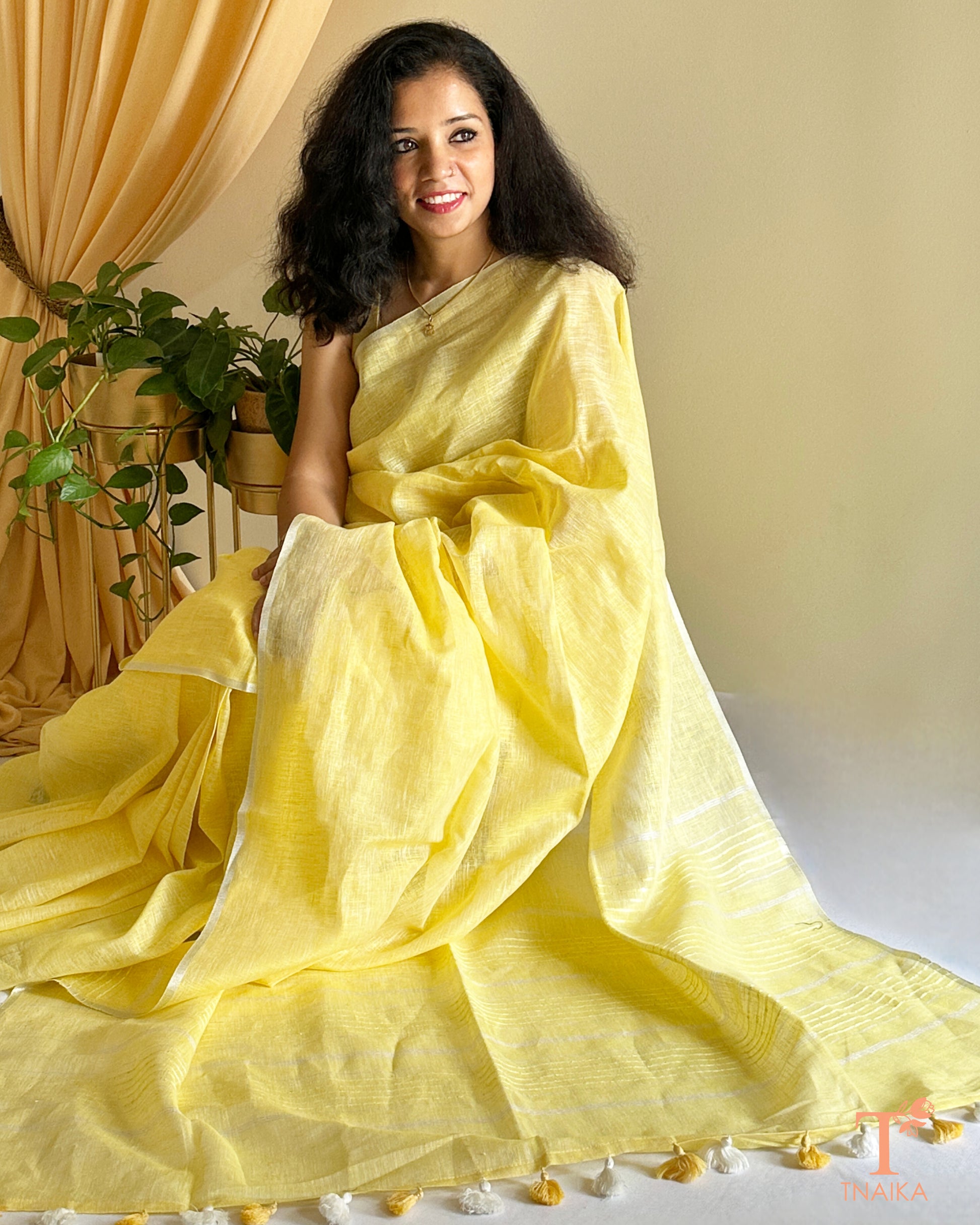 Lemon yellow Linen saree with sequence detail in pallu