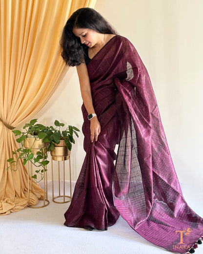 soft linen saree with subtle sheen and plain border