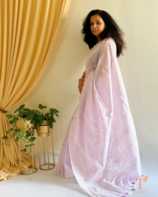 premium linen saree with zari border and minimal motifs
