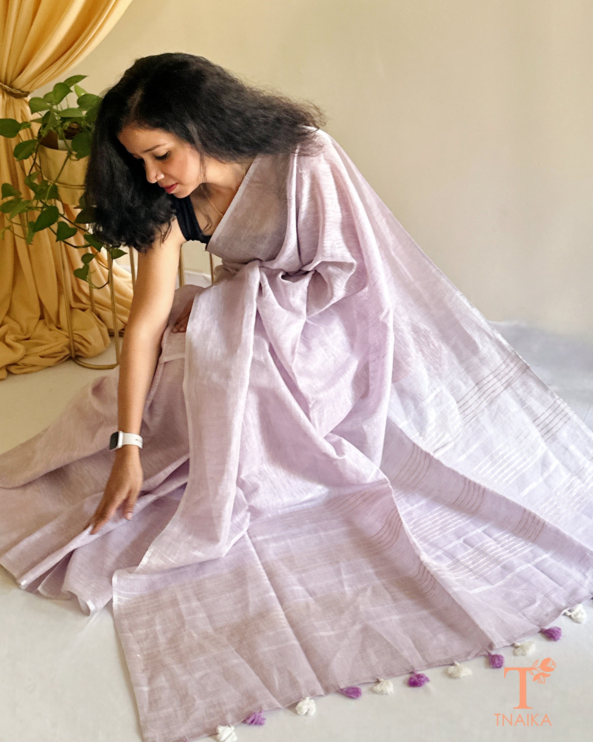 luxury linen saree for women with elegant gold detailing