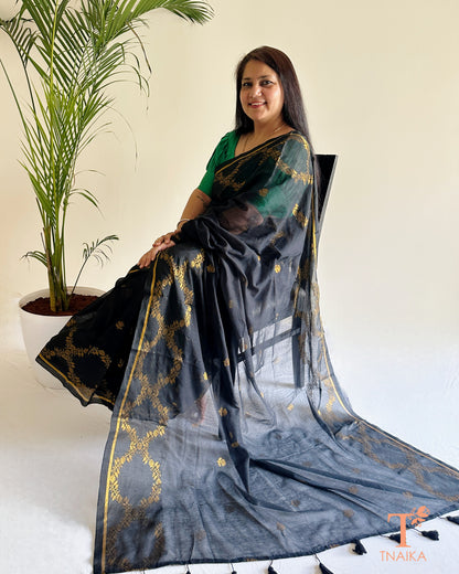Sheer pallu mul cotton jacquard saree with minimal border and tassels