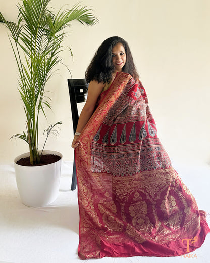 Festive dola silk saree with gold zari work and elegant drape