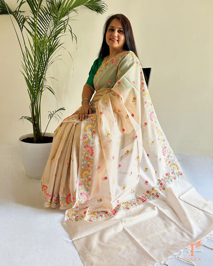Floral embroidered kota silk saree in subtle beige with lightweight airy feel