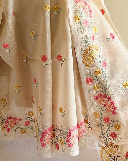 Elegant kota silk saree with fine thread embroidered floral motifs and soft drape