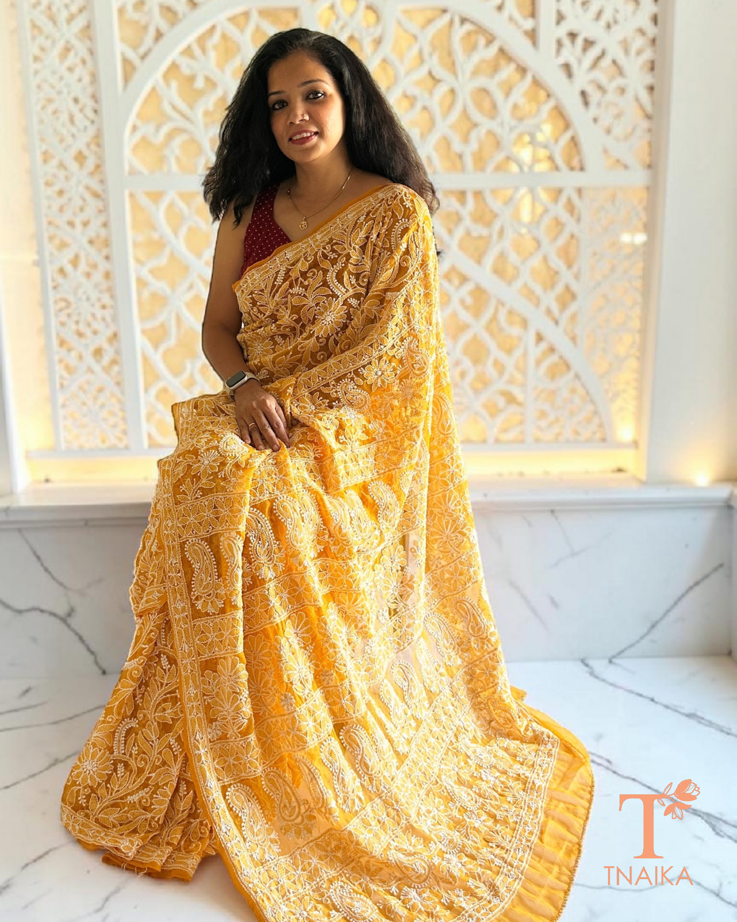 Traditional mustard chikankari saree with fine hand embroidery throughout