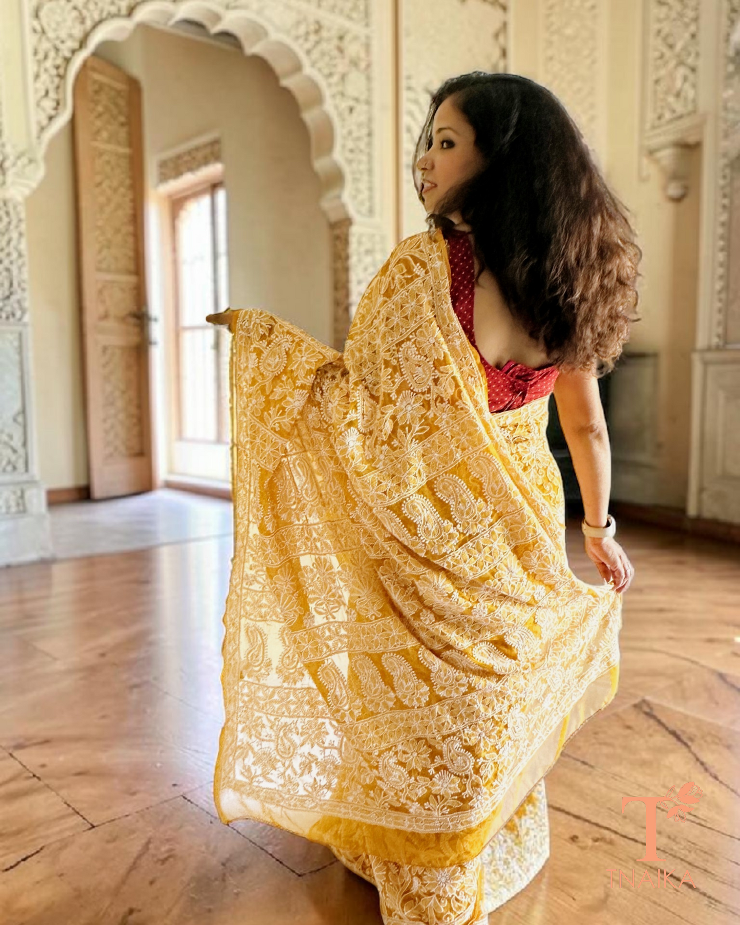 Mustard shade chikankari saree with full jaal design and soft flowing drape