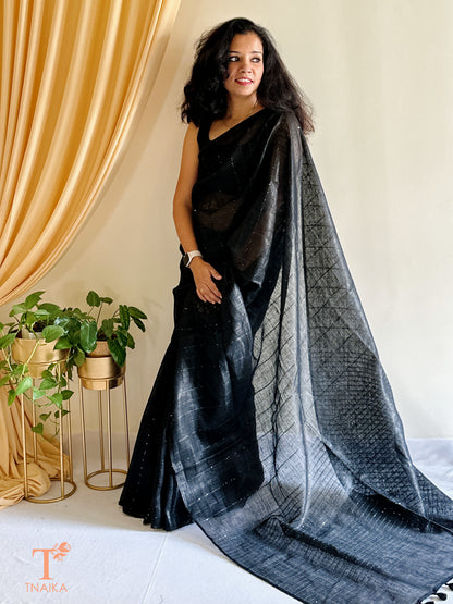 soft linen saree with subtle sheen and plain border