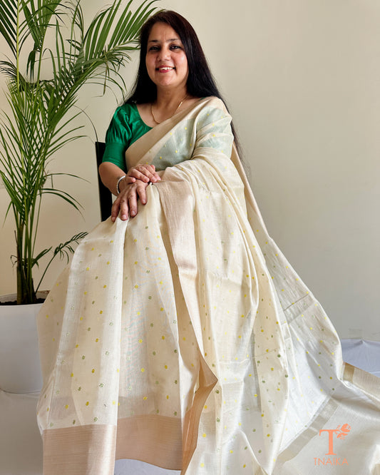 Soft ivory chanderi saree with elegant border and scattered motifs