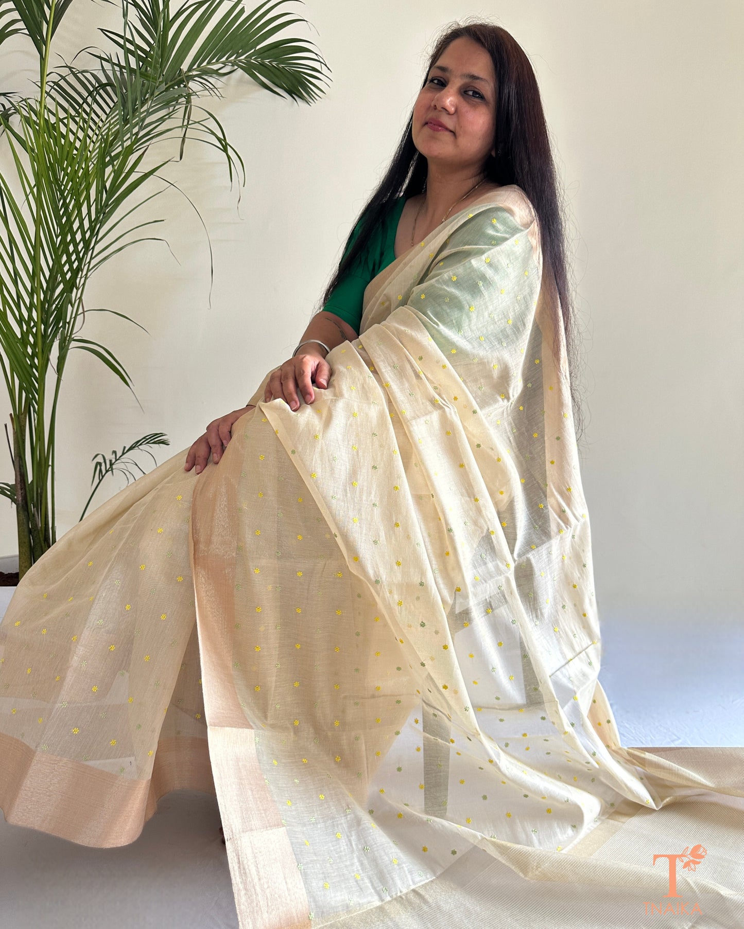 Tissue chanderi saree drape showcasing subtle shimmer and fine weave