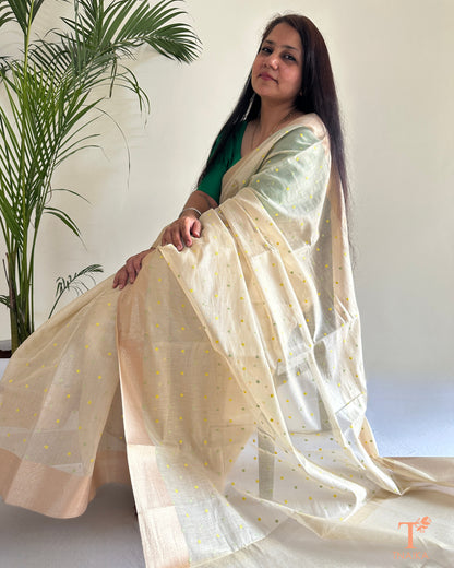 Tissue chanderi saree drape showcasing subtle shimmer and fine weave
