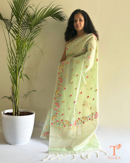 Sheer kota silk saree with pastel floral thread work and embroidered border
