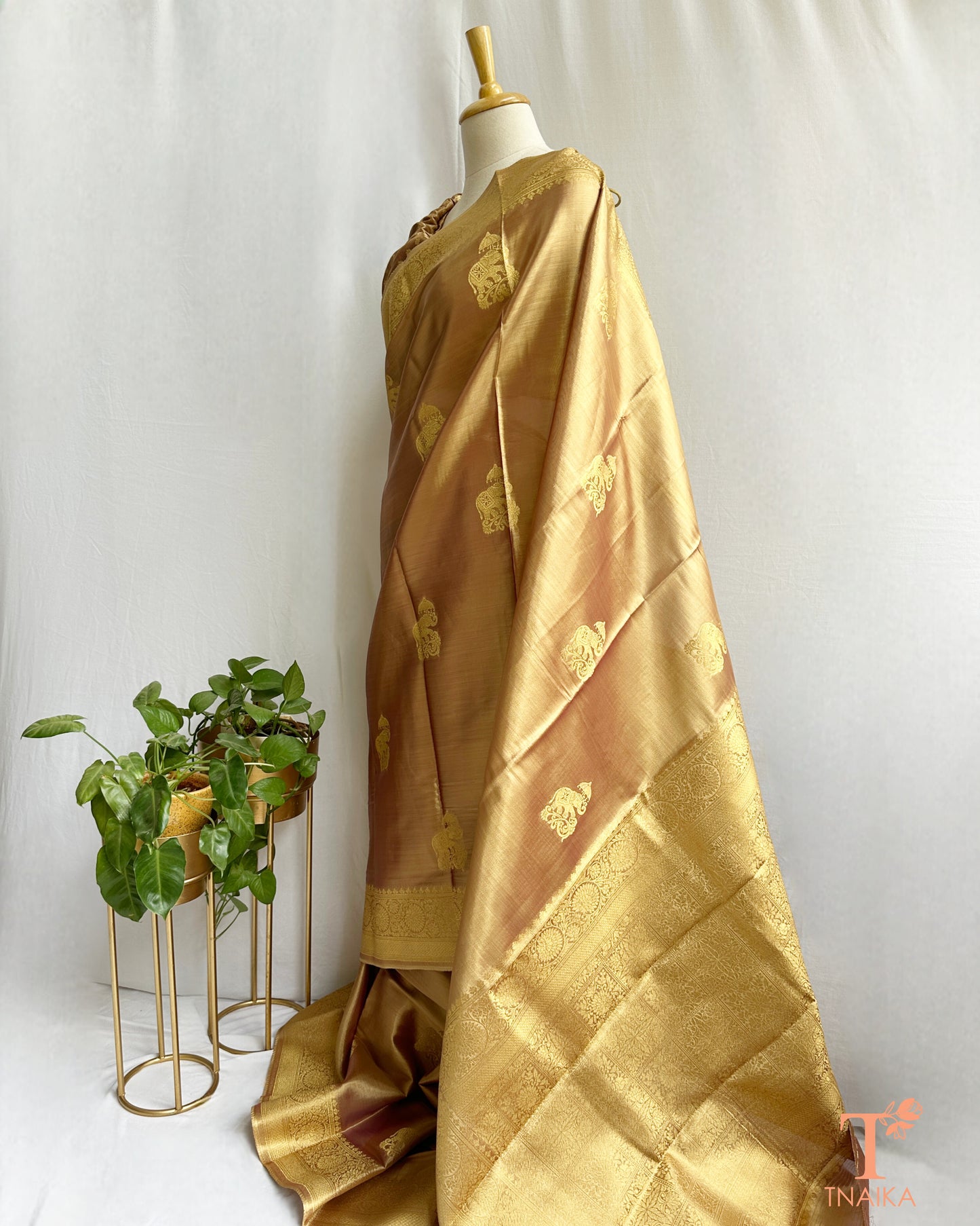 Art silk saree drape showcasing rich pallu and smooth texture