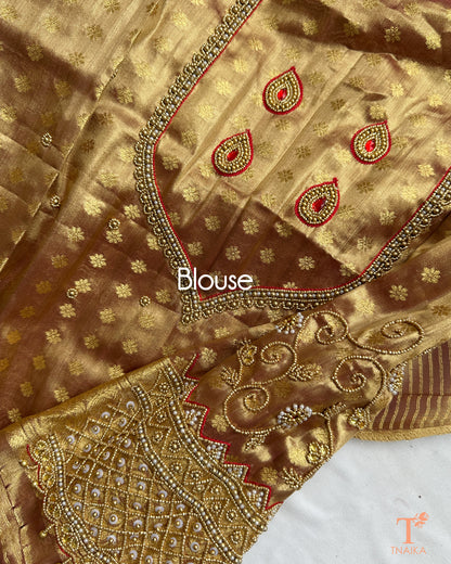 Detailed blouse sleeve with aari work and pearl embellishments