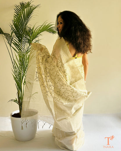 Minimal ivory saree with all-over leaf pattern embroidery