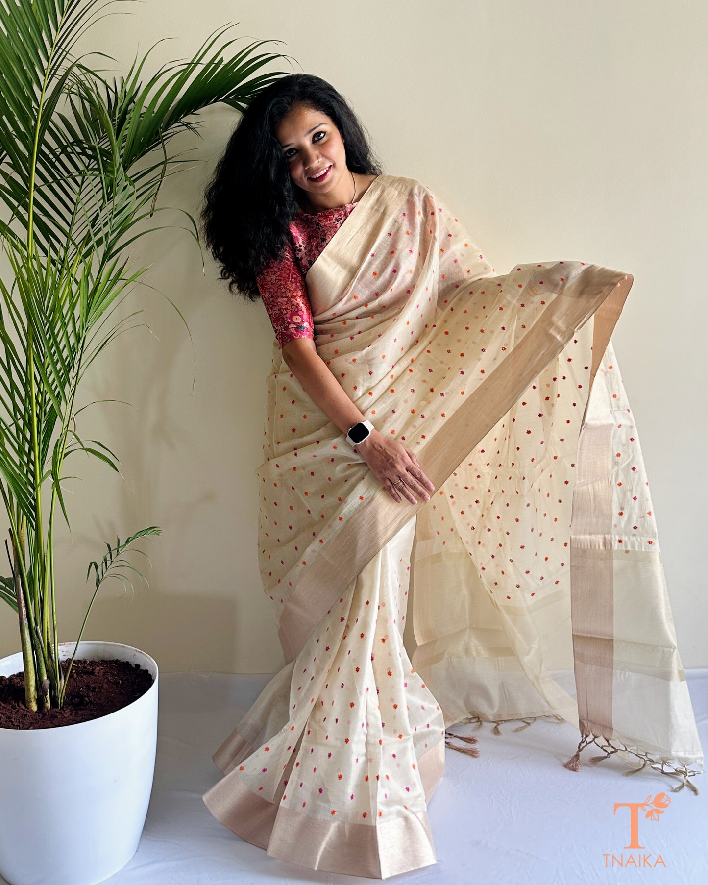 Soft ivory chanderi saree with elegant border and scattered motifs