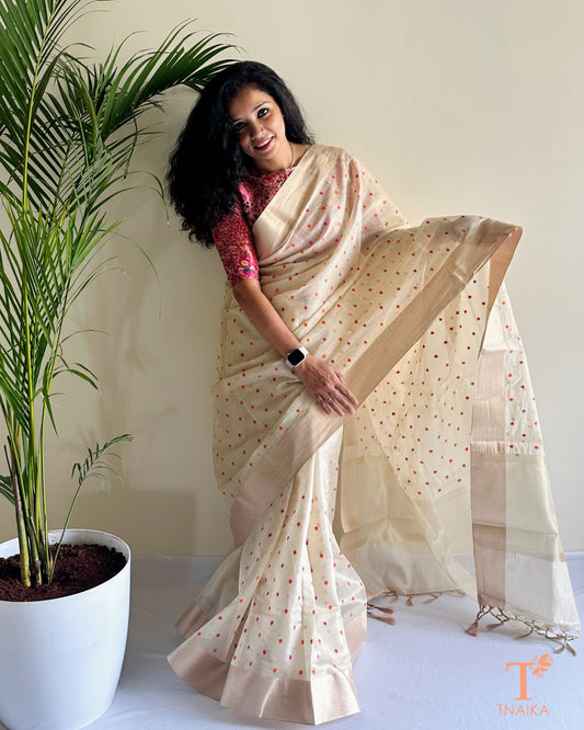 Soft ivory chanderi saree with elegant border and scattered motifs