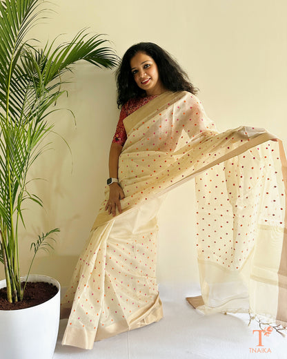 Elegant ivory saree with woven buti detailing and sheer texture
