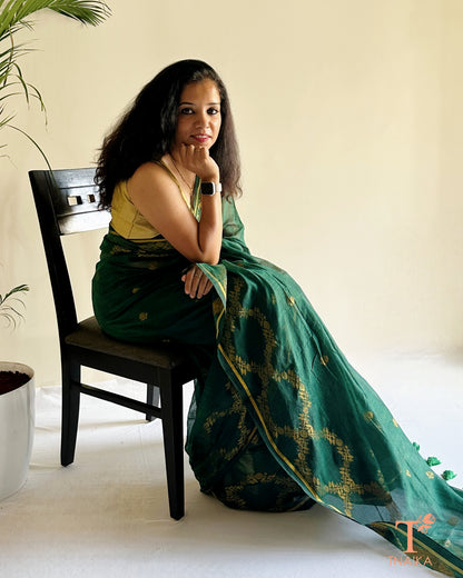 Mul cotton jacquard saree with subtle gold woven motifs and airy drape
