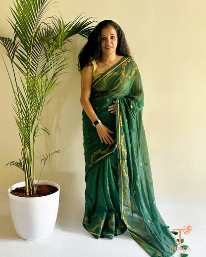 Sheer pallu mul cotton jacquard saree with minimal border and tassels