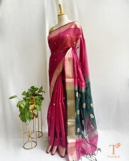 Pink Maheshwari saree with elegant gold zari border
