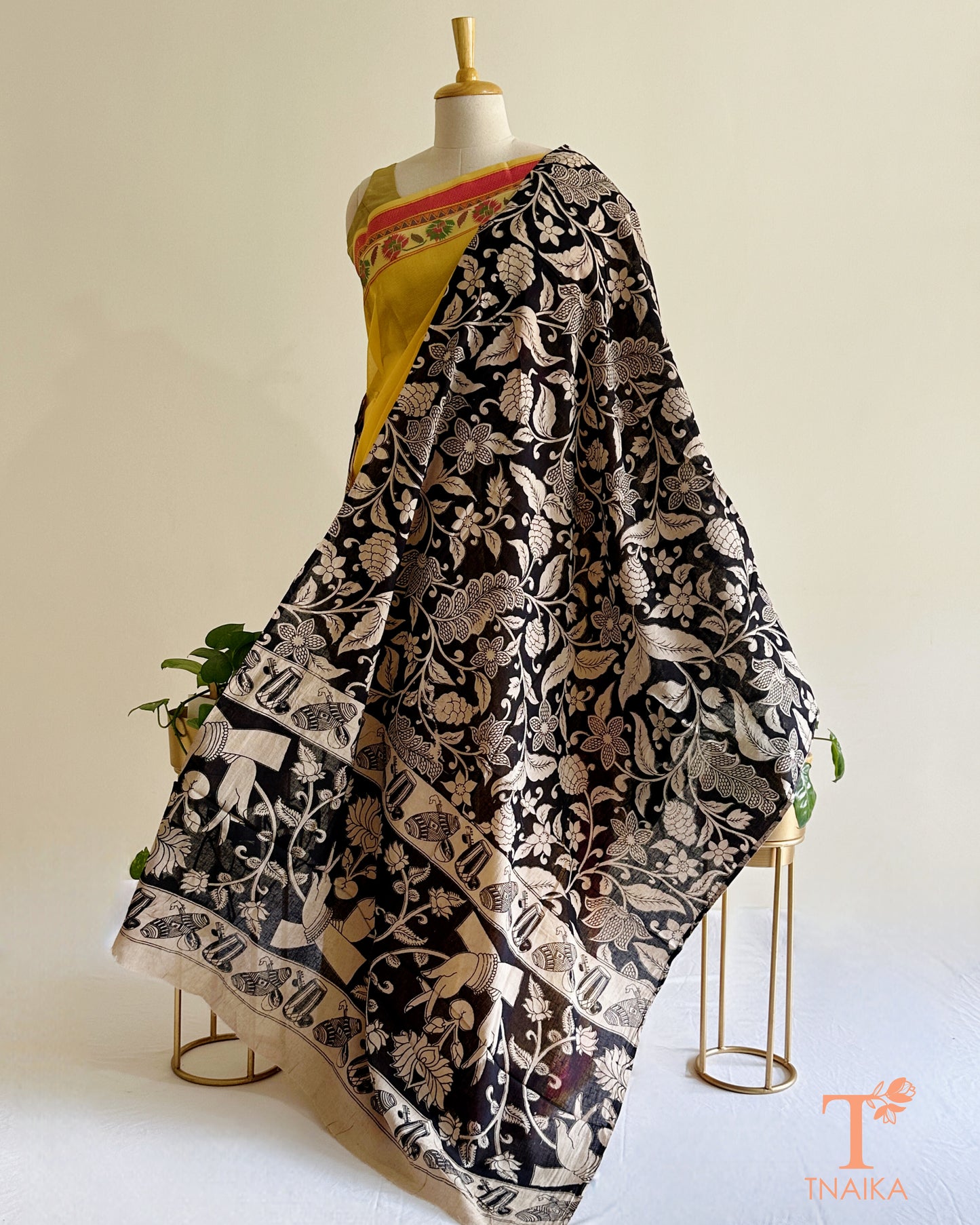 Black cotton Kalamkari dupatta with intricate floral prints and artistic traditional border detailing
