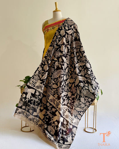 Black cotton Kalamkari dupatta with intricate floral prints and artistic traditional border detailing