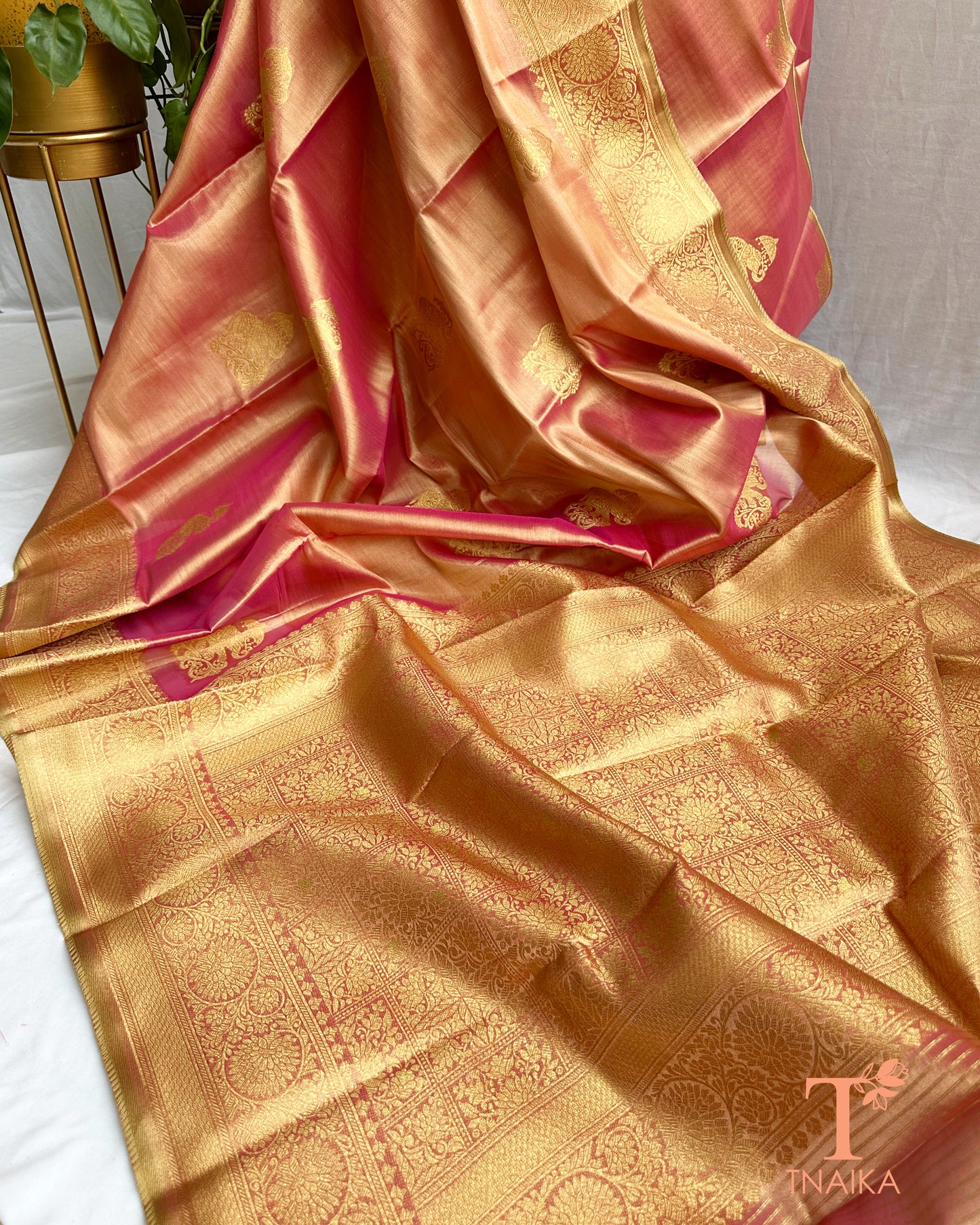 Art silk saree drape showcasing rich pallu and smooth texture