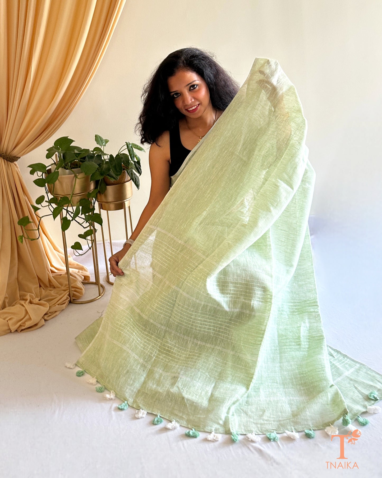 Pista green Linen saree with sequence detail in pallu