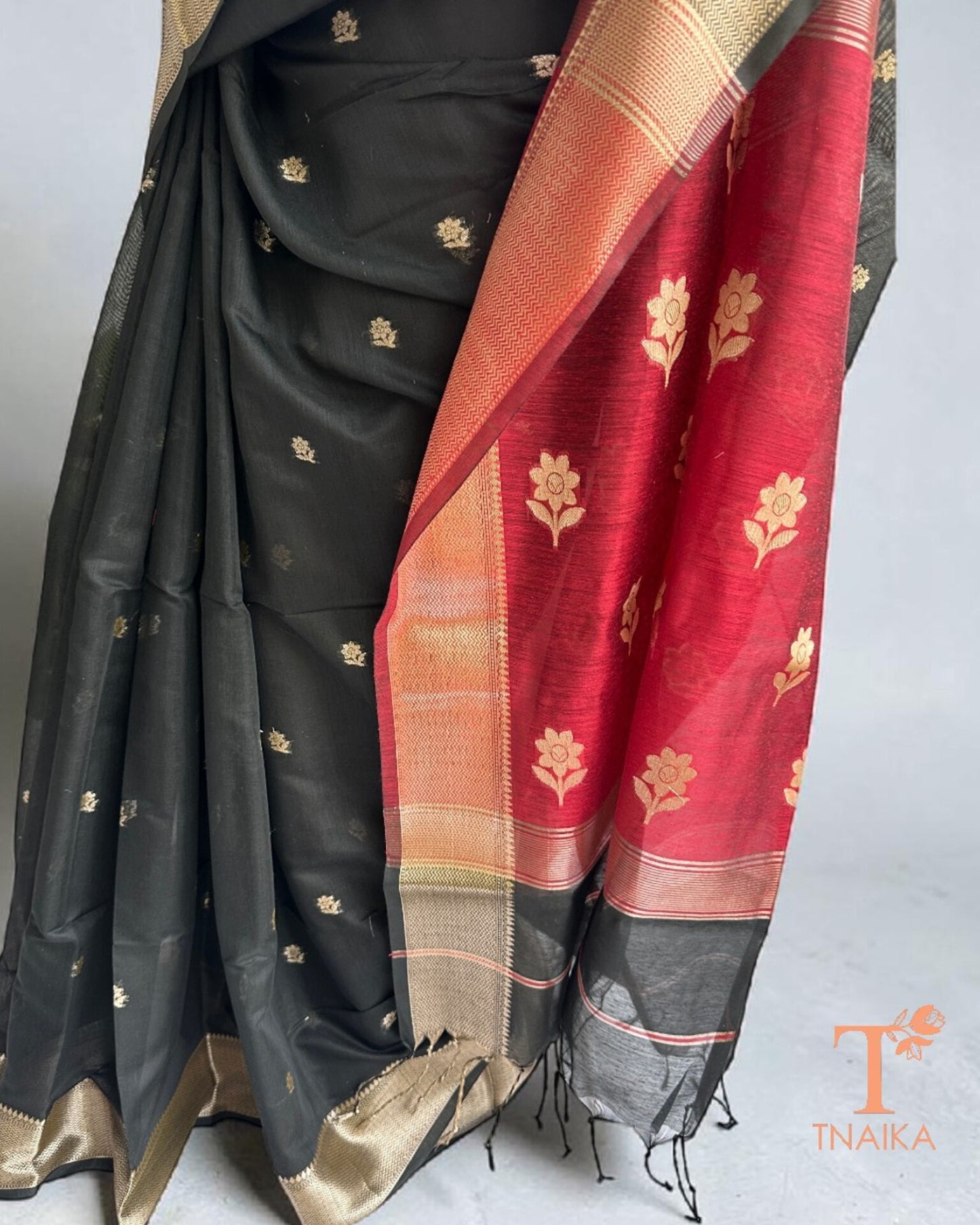 Black Maheshwari saree with elegant gold zari border