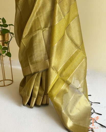 Lightweight olive tissue silk checks saree with golden zari woven pallu and elegant festive sheen
