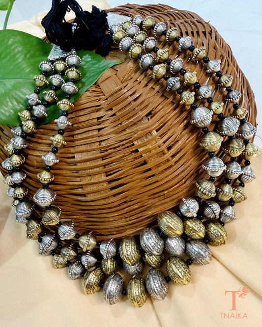 Kanak Layered Bead Mala featuring dual-tone oxidised engraved silver and brass beads in a handcrafted layered statement necklace design.