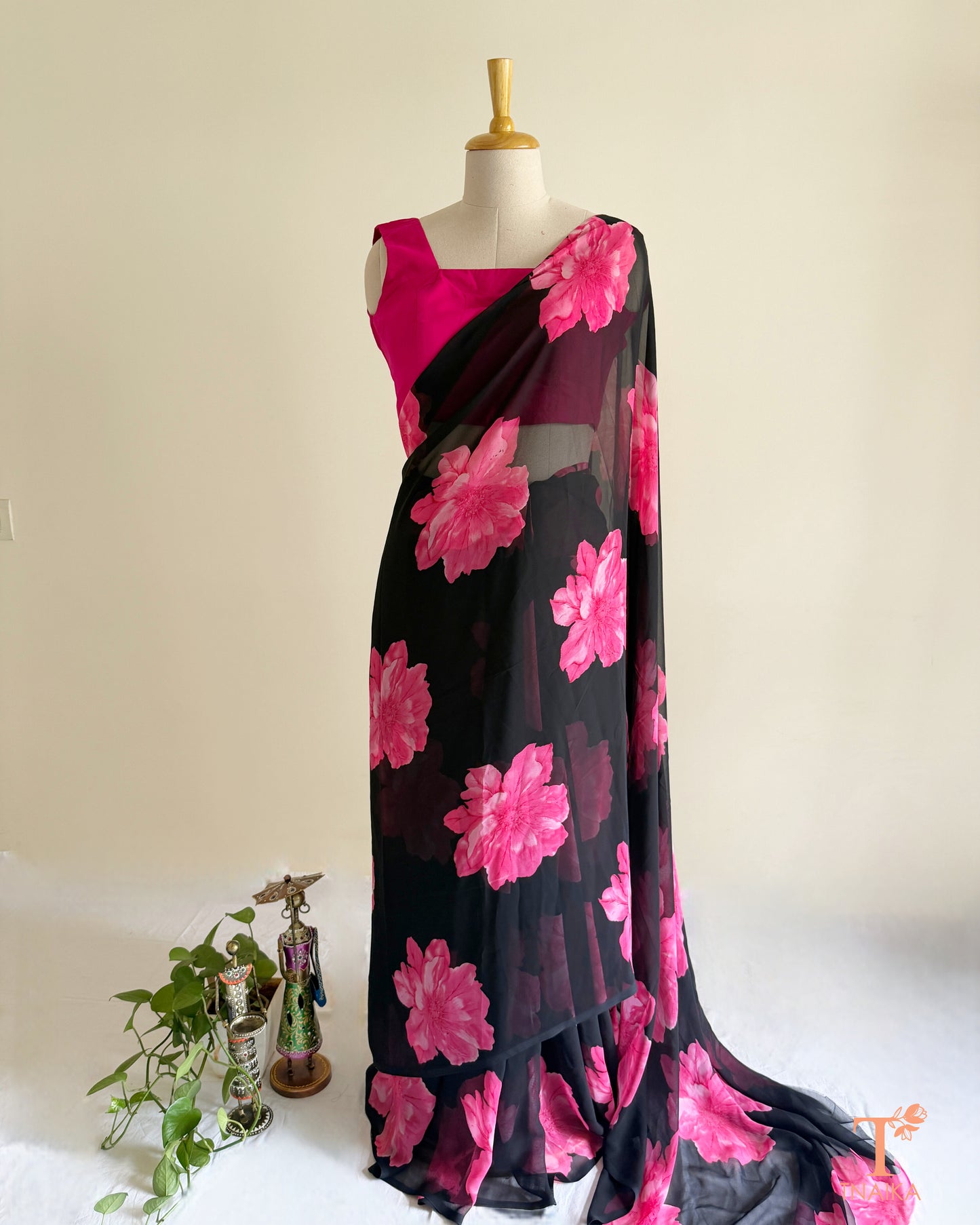 Bright pink saree with pink blossom design