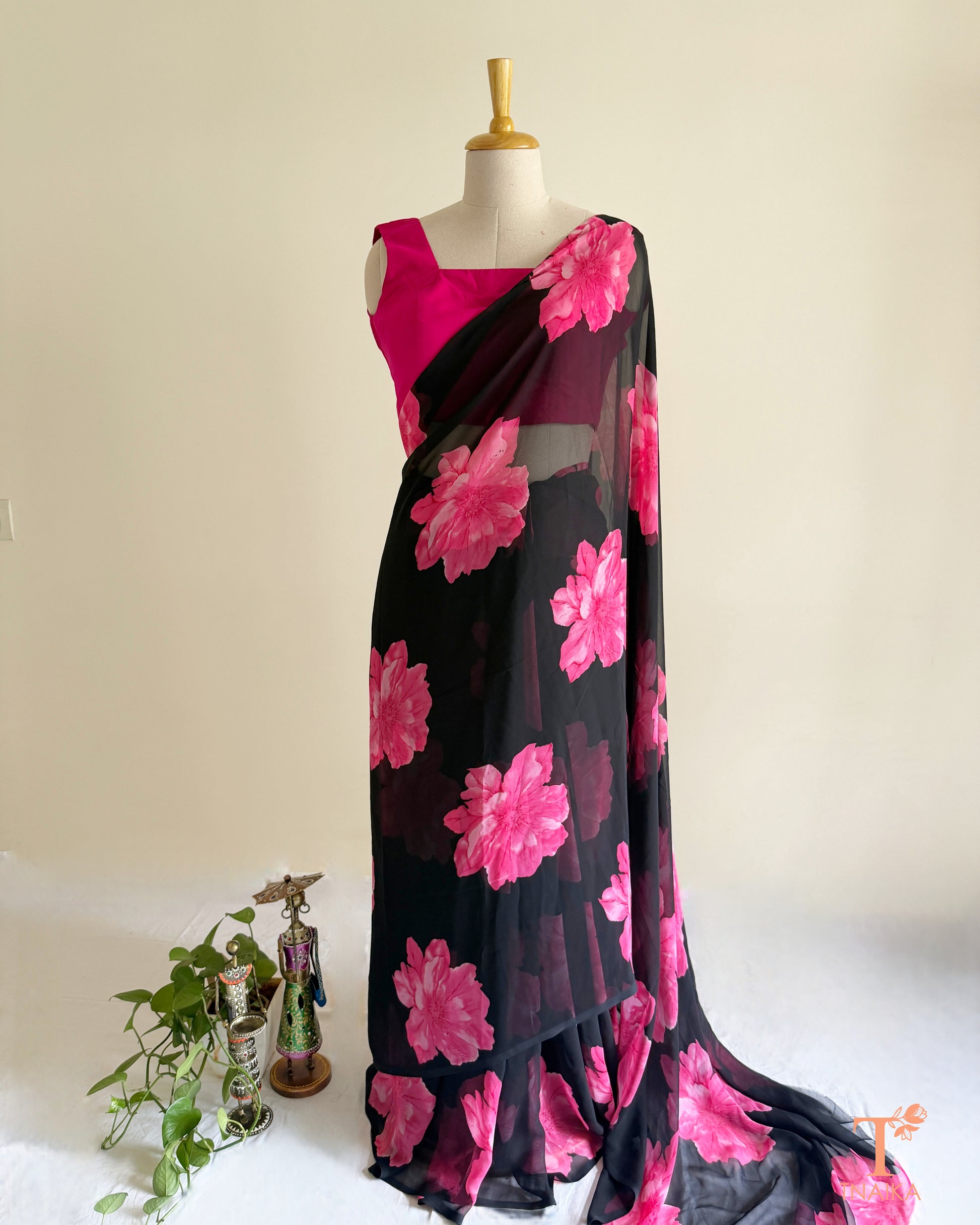 Bright pink saree with pink blossom design