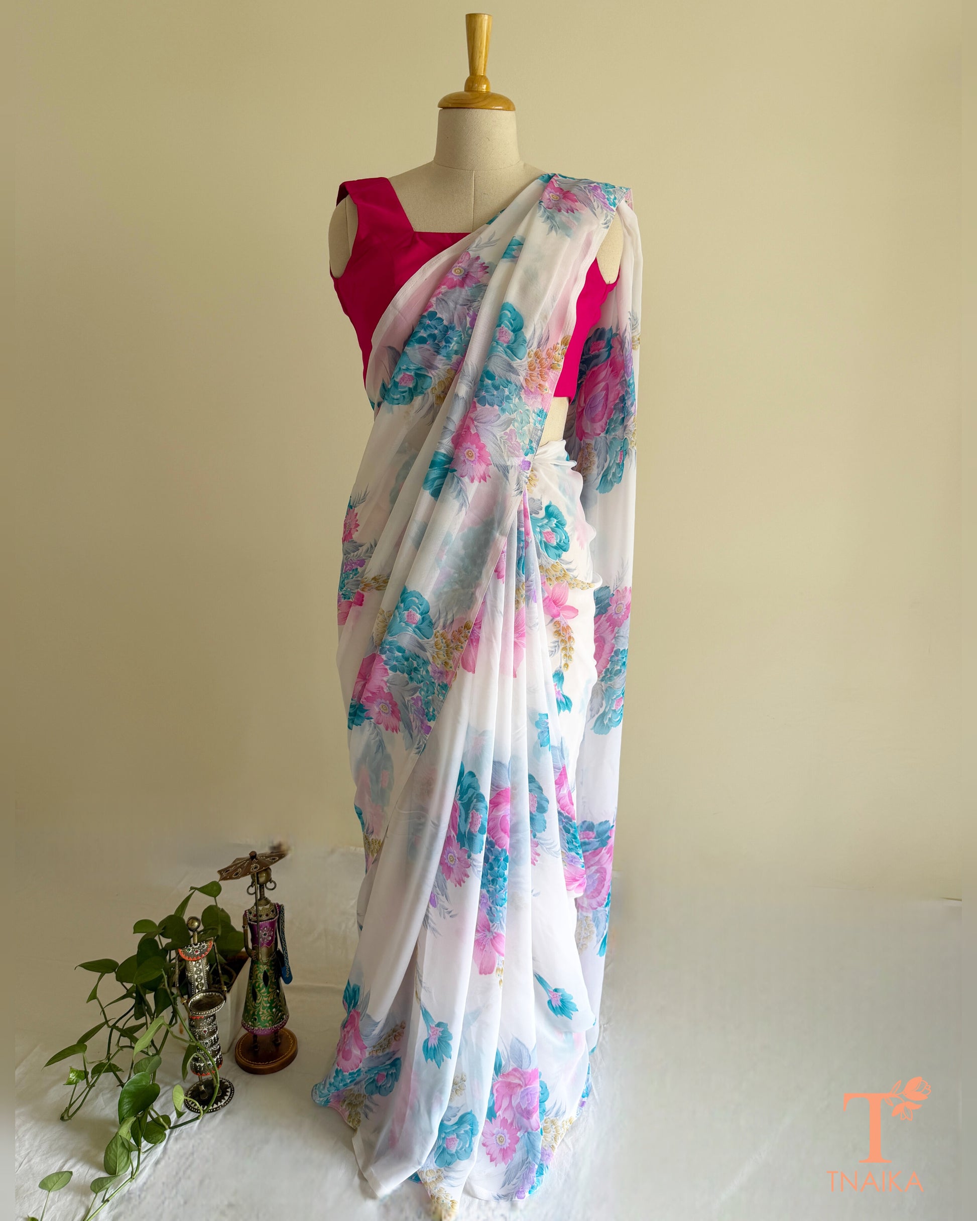 Flowy white floral saree for festive and casual occasions