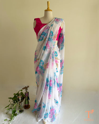 Flowy white floral saree for festive and casual occasions