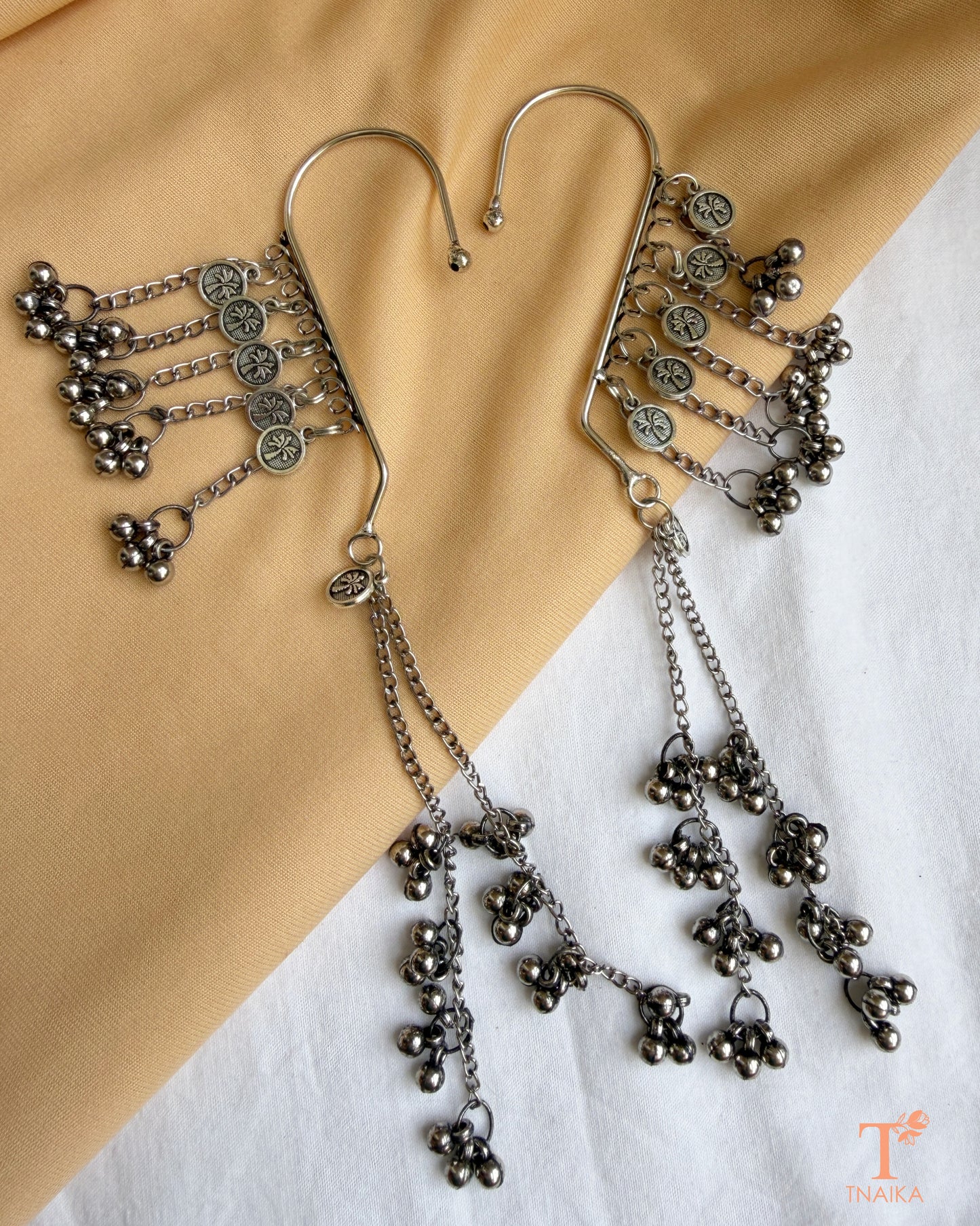 ghungroo accents in a statement ear wrap design