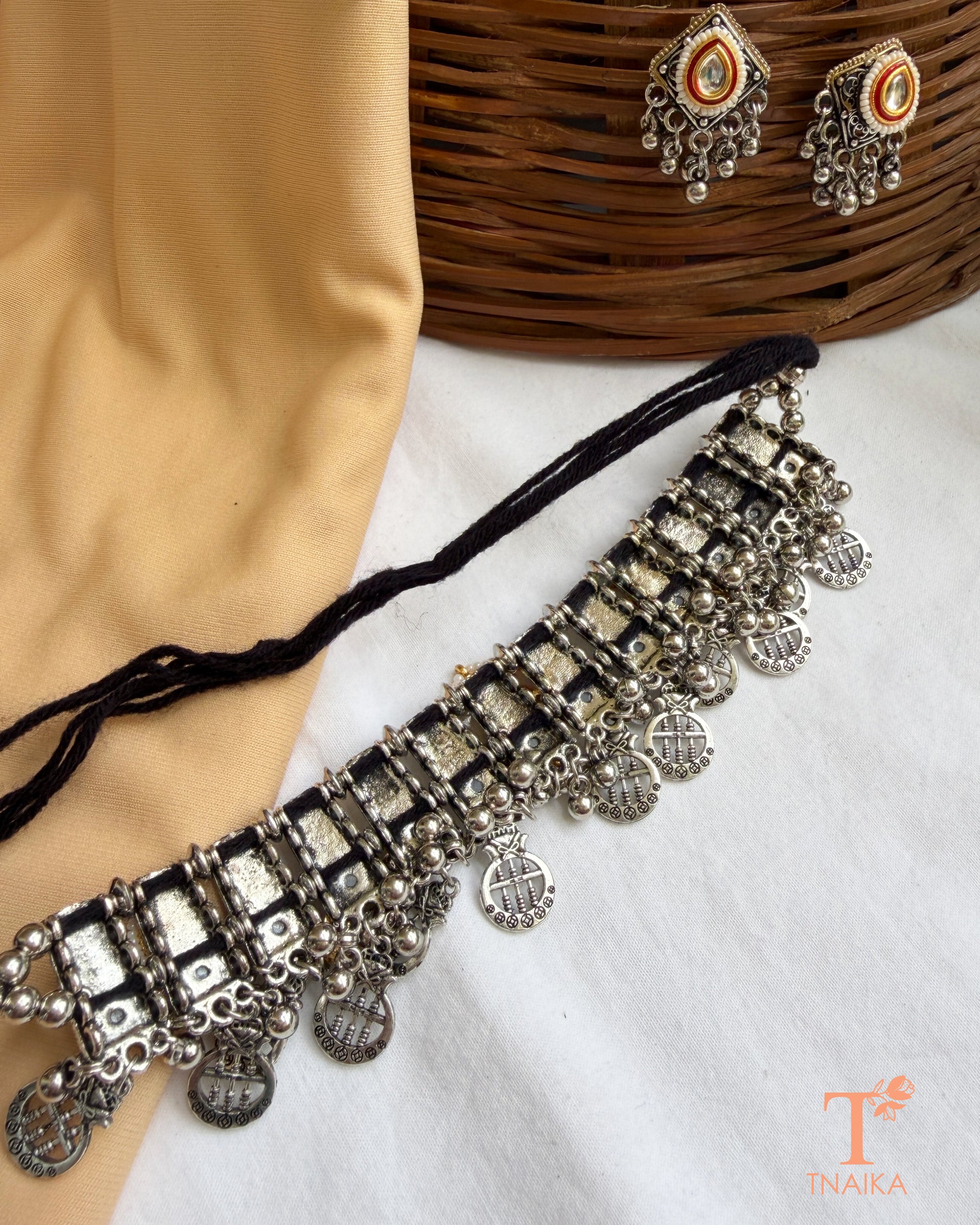 Oxidised silver Rajsi Kundan Virasat statement choker with colourful panchi motifs, floral kundan centerpiece, coin charms and pearl detailing.