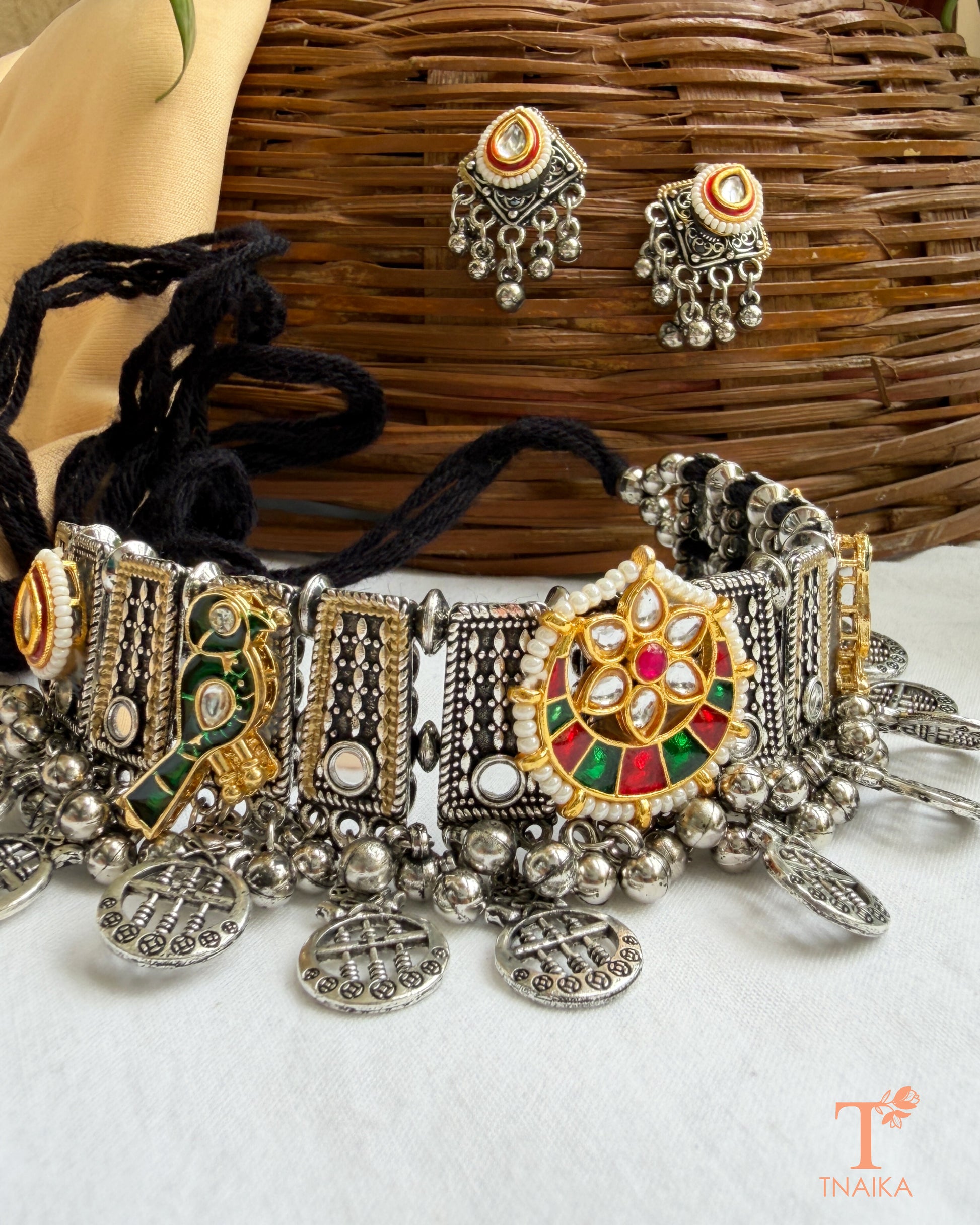 Rajsi Kundan Virasat oxidised silver choker necklace with bird motifs, pearl detailing, kundan accents, coin charms and adjustable black thread closure.