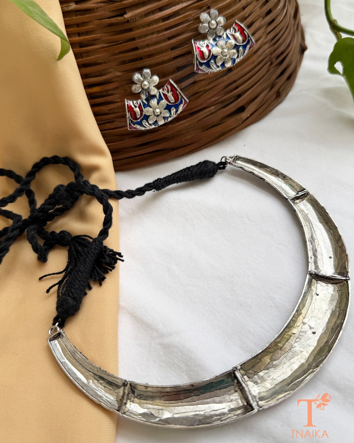 Statement meena work hasli necklace set for festive and ethnic wear.