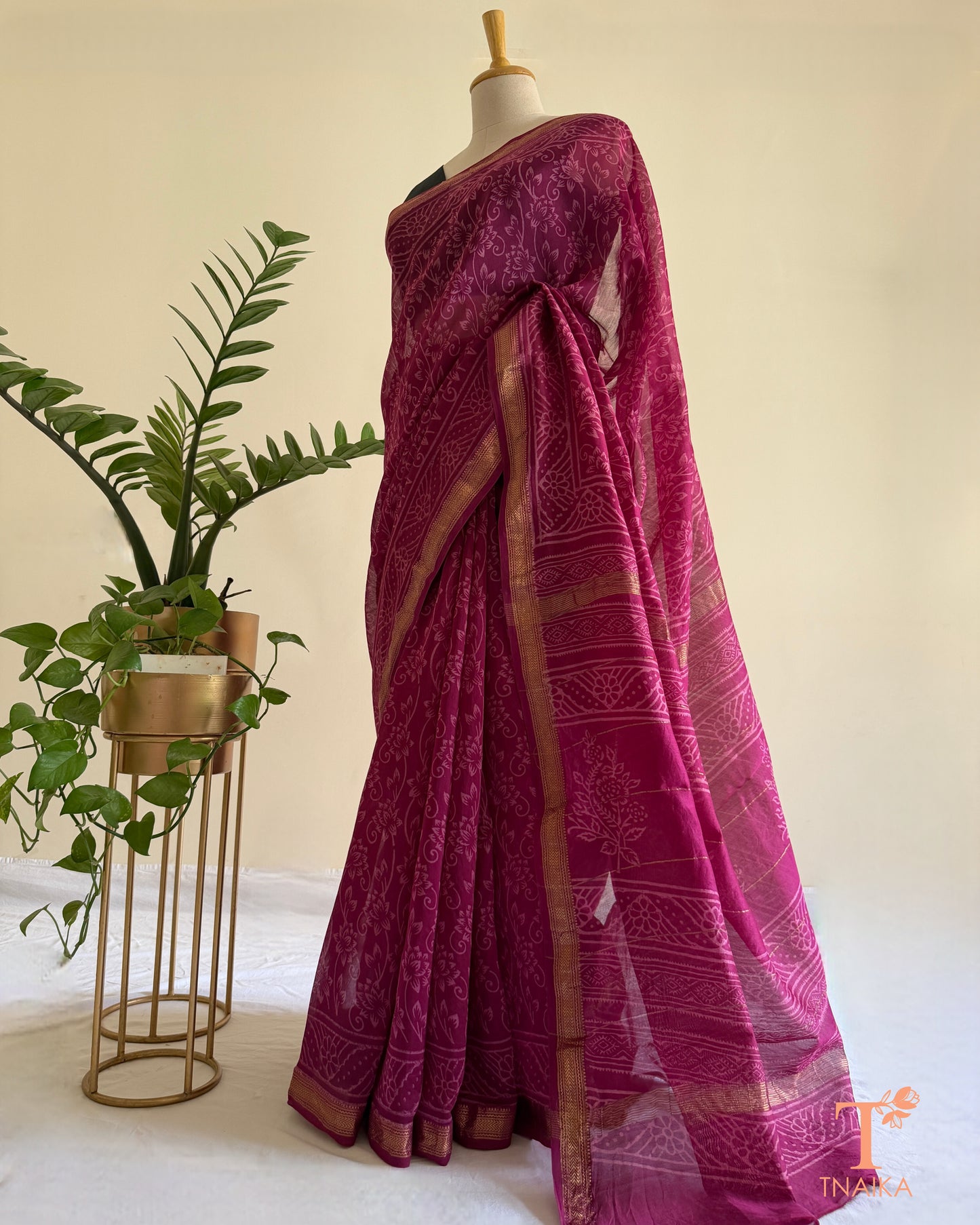 Elegant wine hand-block printed saree with delicate zari border detailing