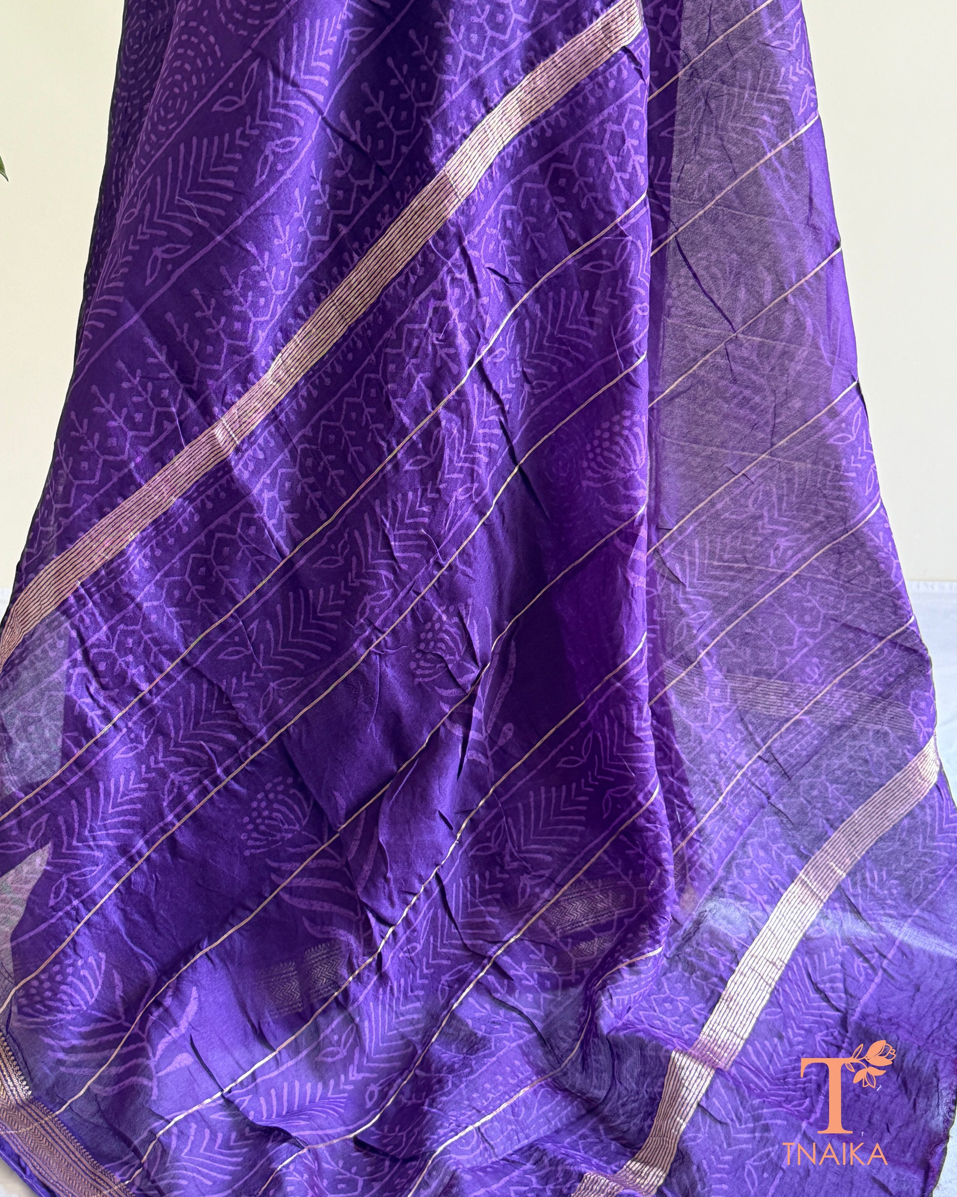 Purple Maheshwari silk saree featuring traditional hand block printed motifs