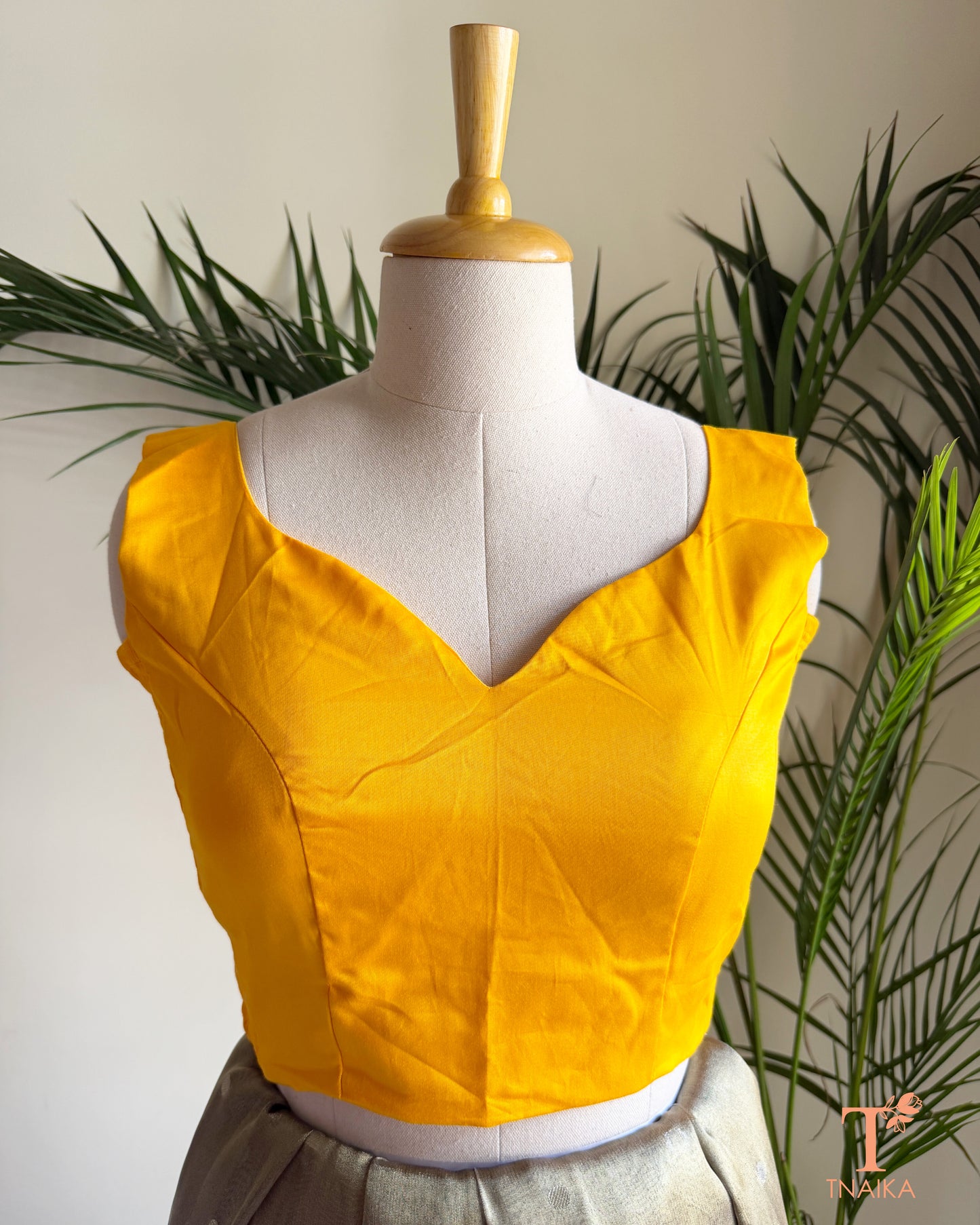 Front view of ready-to-wear cotton silk blouse featuring an elegant sweetheart neckline, broad straps, and premium tailored finish.