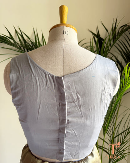 Back view of cotton silk blouse with clean tailored finish and comfortable cotton lining.
