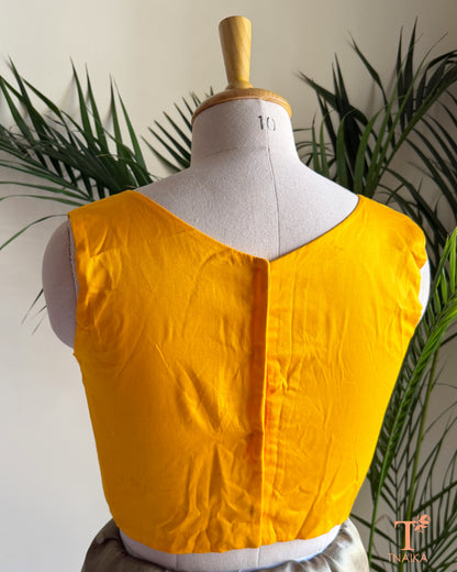 Back view of cotton silk blouse with clean tailored finish and comfortable cotton lining.